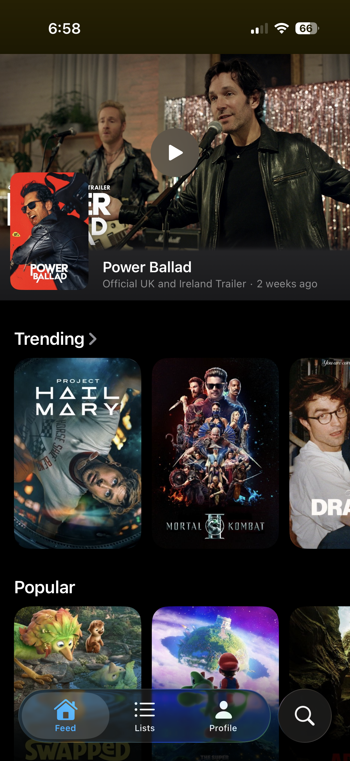 Cineduel feed showing a trailer hero, trending titles, and popular movies